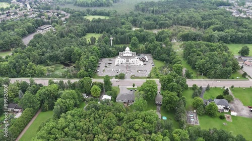 Aerial footage of Gurudwara Singh Sabha Cambridge on a cloudy day in, Ontario, Canada photo