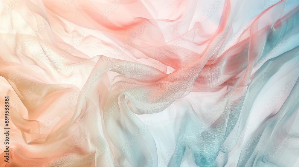 Fototapeta premium Delicate waves of fabric in blue and pink tones blend in a harmonious, dreamy swirl.