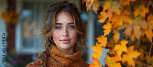 Portrait of a Young Woman with Autumn Leaves © GoDress