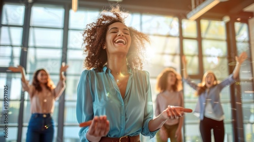 Woman celebrating success in office