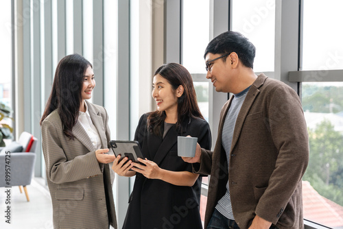 Asian business start up freelance people team analyzing statistics financial. Group Team of businesspeople man and woman Meeting Conference Discussion various topic Corporate Concept in office.