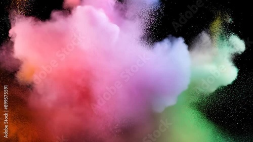 Colorful powder burst display in dark environment