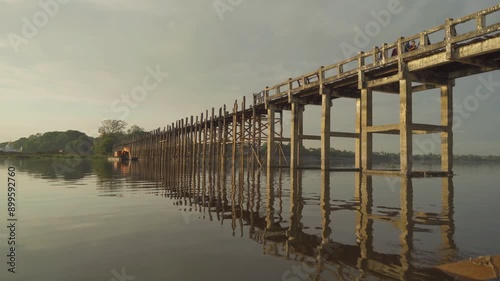 U Bein Bridge with lake, Wooden Bridge in Mon village, Myanmar or Burma, Asia.