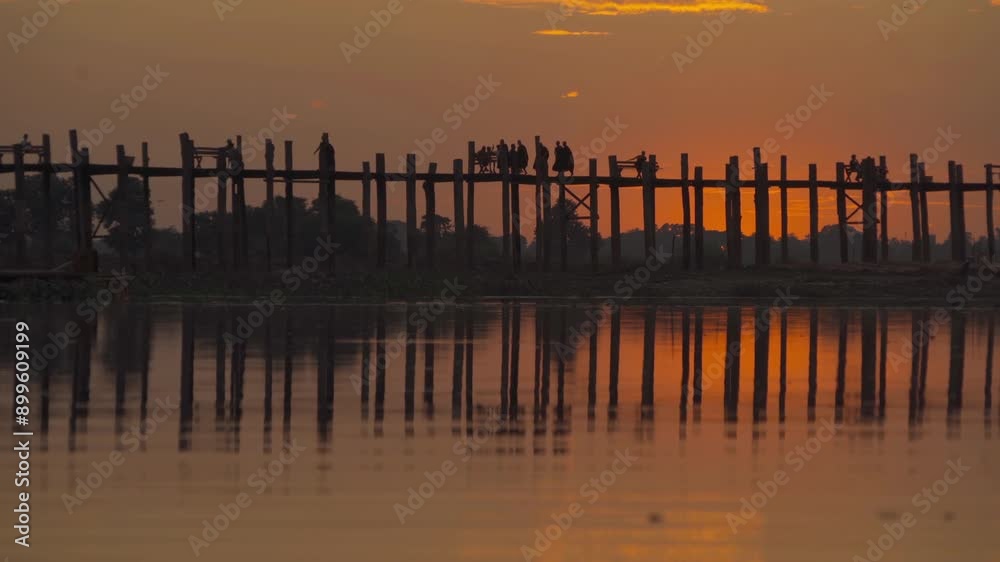 U Bein Bridge with lake, Wooden Bridge in Mon village, Myanmar or Burma, Asia. U Bein Bridge with lake, Wooden Bridge in Mon village, Myanmar or Burma, Asia.