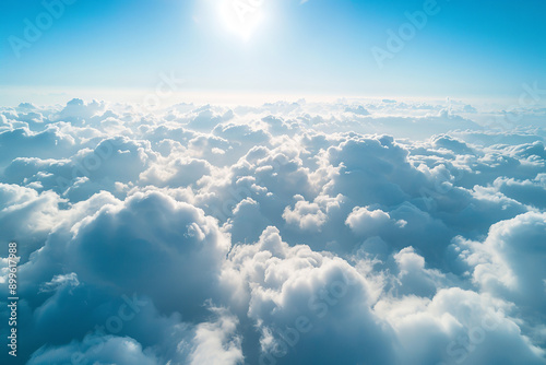 Tranquil Aerial View of Cumulus Clouds with Sunlit Highlights 