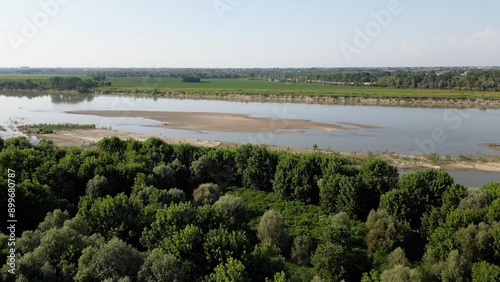 Obraz na płótnie Europe, Italy, Pavia Drought and aridity river - Po and Ticino , dry beach of sand and water shortage, water emergency in Lombardy - Drone view in Ponte della Becca - Climate change global warming w salonie