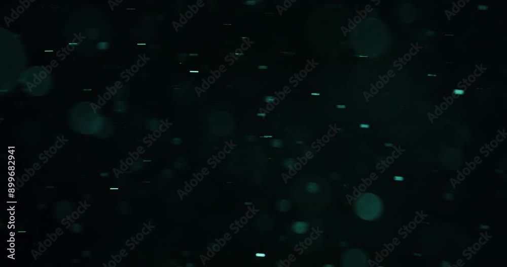 Cyan Bokeh Particles Flowing To The Right