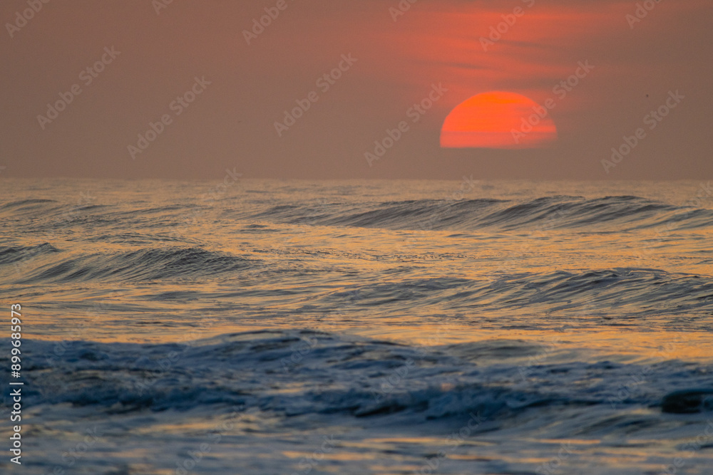 Cloudy Ocean Sunrise with sun in upper right Cloudy Ocean Sunrise with sun in upper right