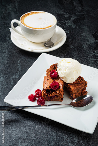 tasty brownie with cappucino on tabe photo