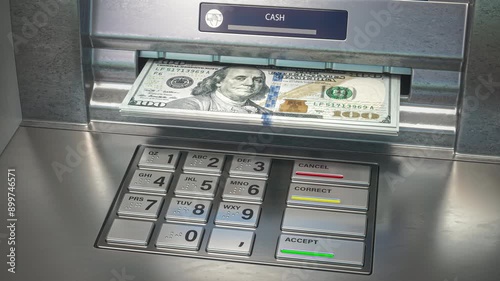 Dollar in ATM cash dispenser. Withdrawal, payment transaction of cash from bank terminal.