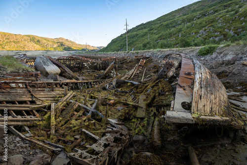 the cemetery of old ships on the seashore in the village of Teriberka, Murmansk region