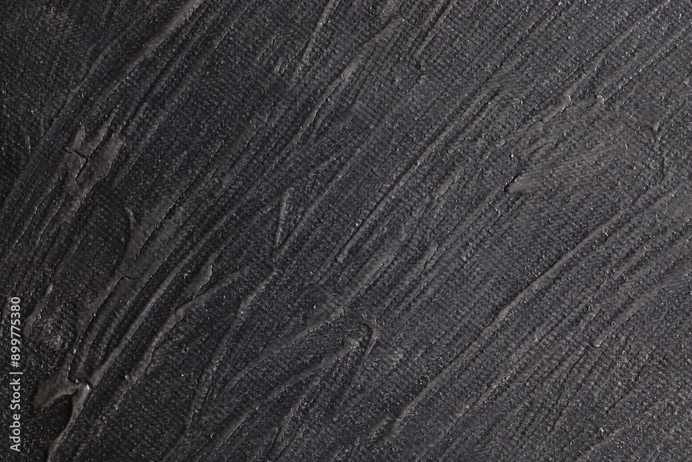 Superficie con texture materica molto irregolare dipinta di colore grigio-nero; spazio per testo Superficie con texture materica molto irregolare dipinta di colore grigio-nero; spazio per testo