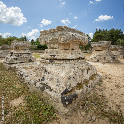 Olympia archaeological site with parts of columns, Greece