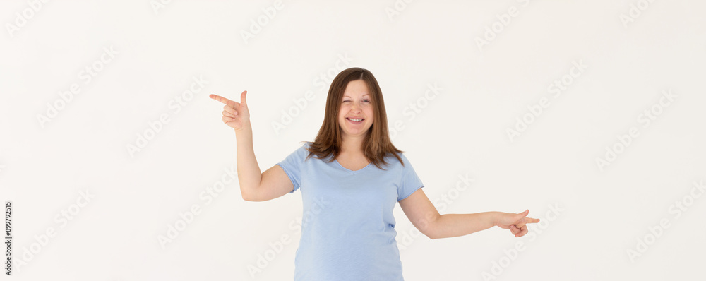 Image of beautiful woman pointing fingers left and right, making decision, showing two variants choices, standing over white background Image of beautiful woman pointing fingers left and right, making decision, showing two variants choices, standing over white background