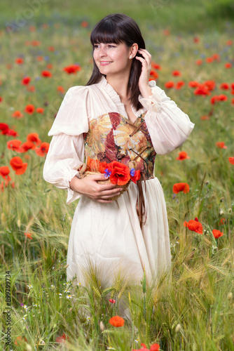 young medieval maid in love waiting on flower meadow