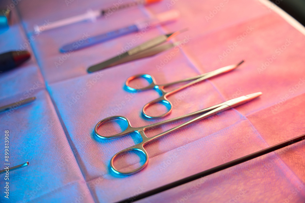 Fototapeta premium Set of stainless steel medical tools prepared for hemorrhoidectomy procedure