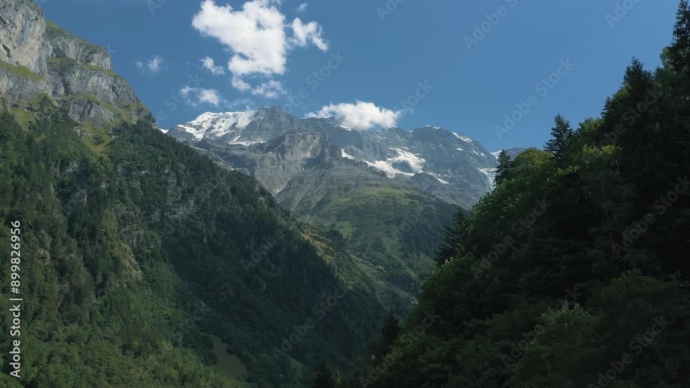 Drone reveal of scenic mountainous landscape in the Swiss alps. Drone reveal of scenic mountainous landscape in the Swiss alps.