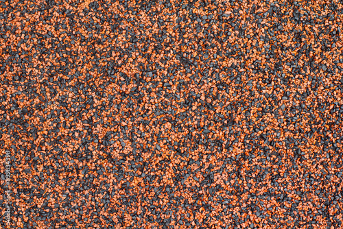 Texture of color rubber floor on Stadium or Granules playground cover background.
