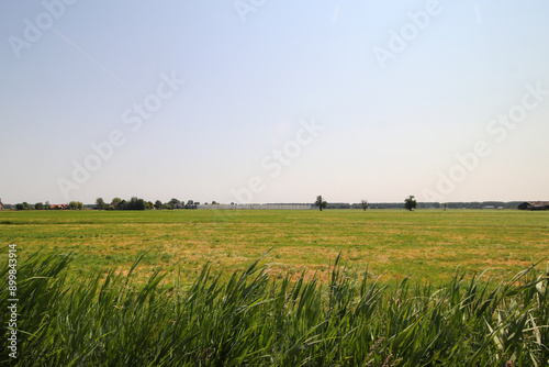 Ditches and meadows of the Middengebied of the Zuiidplaspolder between Gouda and Rotterdam in Zuidplas photo