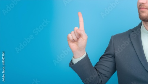 Lecturer's finger pointing to blackboard for explanation