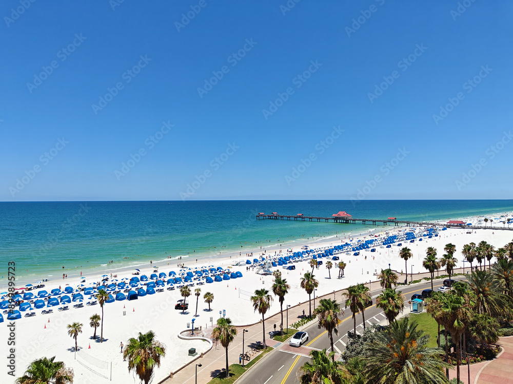 View of Clearwater beach with umbrellas and chairs. Florida, USA. View of Clearwater beach with umbrellas and chairs. Florida, USA.