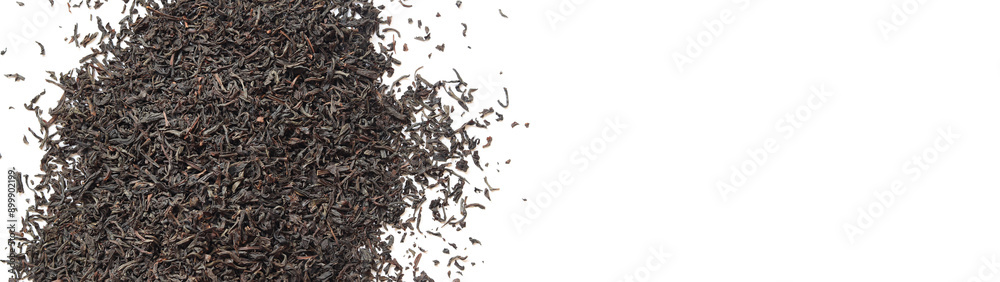 Black long tea on a white background. Top view of dried tea leaves. Tea composition. Ingredients for a hot drink, close-up. Background. Presentation of the type and variety of tea Black long tea on a white background. Top view of dried tea leaves. Tea composition. Ingredients for a hot drink, close-up. Background. Presentation of the type and variety of tea