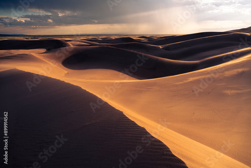 Fototapeta Naklejka Na Ścianę i Meble -  sand dunes at sunset in Colorado 
