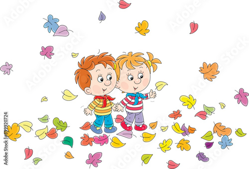 Happy little boy and girl w...
