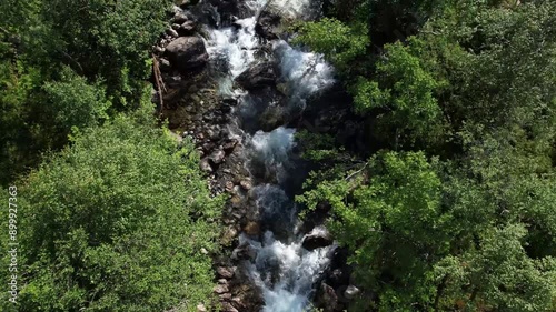 drone aerial view of vengedalen valley in alndalsnes in summer with stream and lake photo