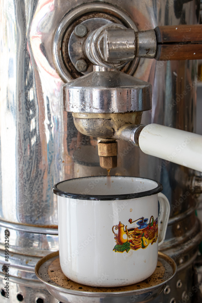 Coffee Maker in a Coffee Town, Brewing a Cup of Colombian Mountain Coffee Coffee Maker in a Coffee Town, Brewing a Cup of Colombian Mountain Coffee