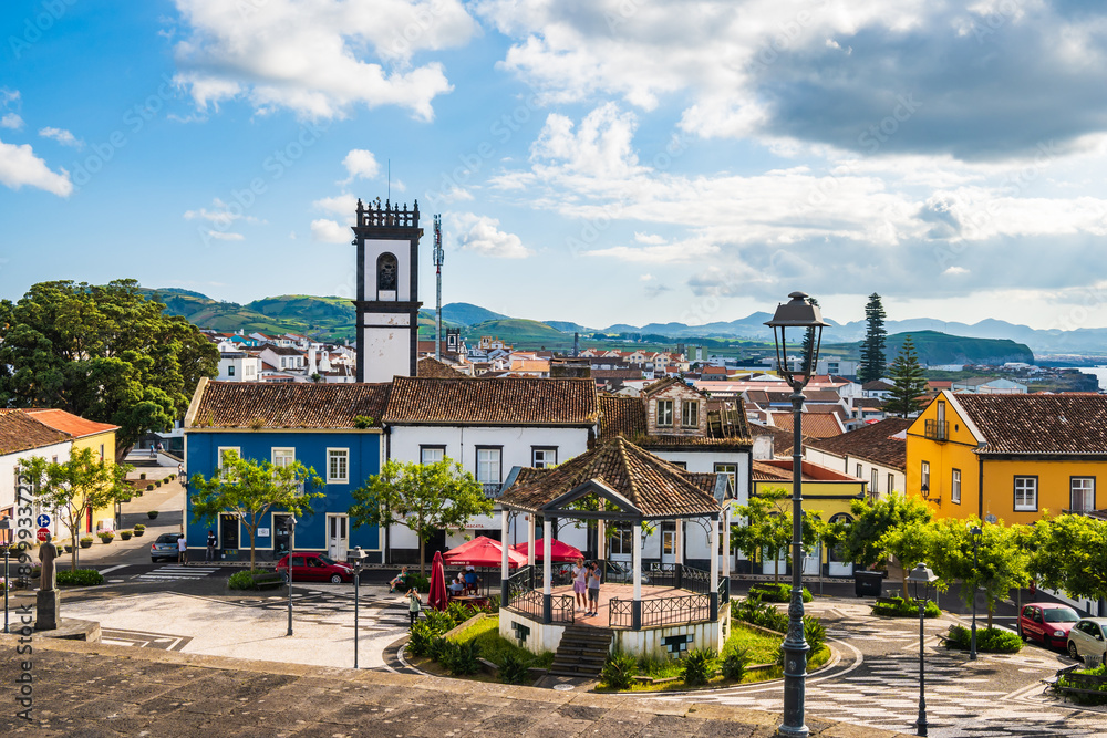 RIBEIRA GRANDE, SAN MIGUEL ISLAND - JUN 21, 2024: Historic buildings with houses and restaurants in main square of Ribeira Grande town, Sao Miguel island, Azores, Portugal