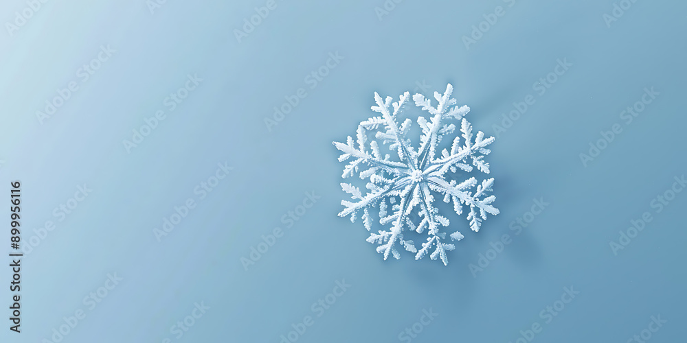 A snowflake is on a blue background