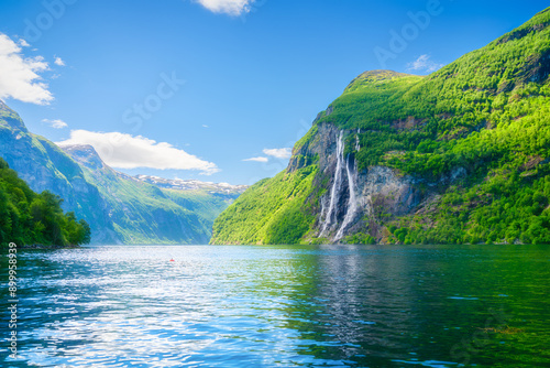 Seven Sisters Waterfall, Geiranger Fjord, Norway. Nature in fjords. Panoramic view. Traveling on a Norwegian fjord. Scandinavia. Vacation and travel in summer Norway.