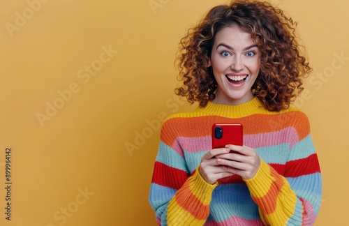 Woman Using Phone With Excited Expression