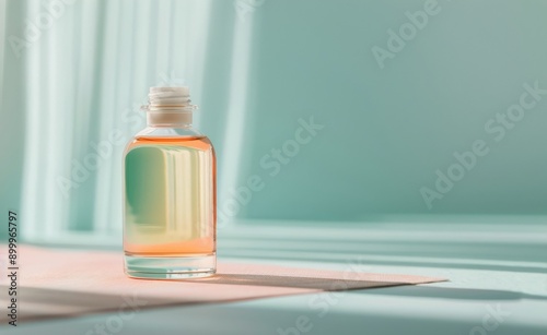 Glass Dropper Bottle on Blue Surface