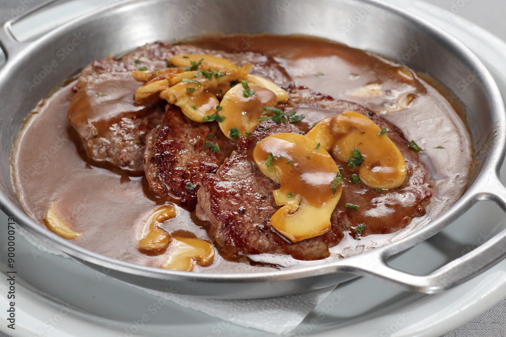 Filet mignon escalope with Madeira sauce and mushrooms with mashed potatoes Filet mignon escalope with Madeira sauce and mushrooms with mashed potatoes