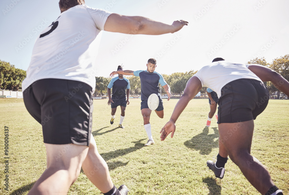 Sports, drop kick and rugby team on field for training, match or skill development for try. Fitness, defense and player with ball for scoring at practice, game or tournament with opponent at stadium. Sports, drop kick and rugby team on field for training, match or skill development for try. Fitness, defense and player with ball for scoring at practice, game or tournament with opponent at stadium.