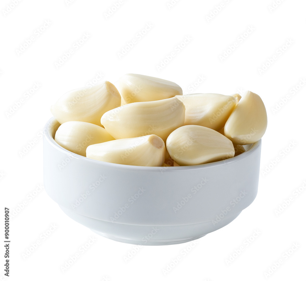 garlic in a ceramic bowl isolated on white background. garlic in a ceramic bowl isolated on white background.