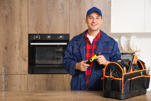 Male technician with bag of...