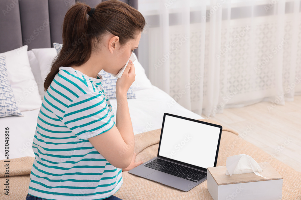 Sick woman having online consultation with doctor via laptop at home Sick woman having online consultation with doctor via laptop at home