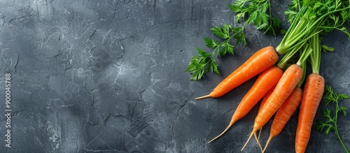 A bunch of fresh carrots on...
