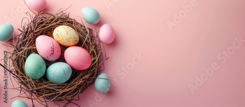 Colorful Easter eggs nestle...