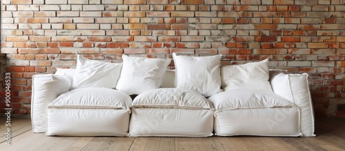 A comfy white sofa with cus...