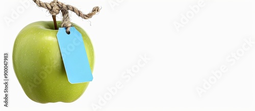 Green apple with a blue tag...