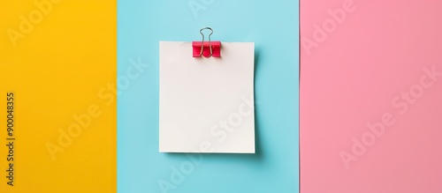 White sticky note pinned on...