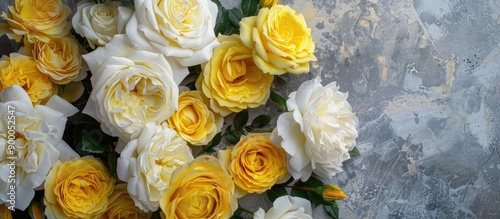 Yellow and white roses show...