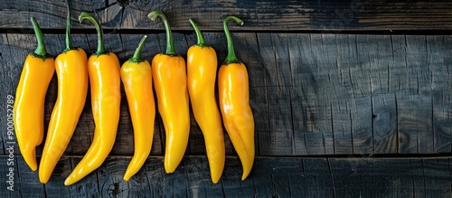 Yellow chili peppers arrang...