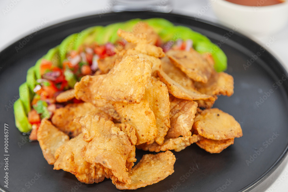 Comida de Entrada Mexicana, Acompañada por Salsa Pico de Gallo Comida de Entrada Mexicana, Acompañada por Salsa Pico de Gallo