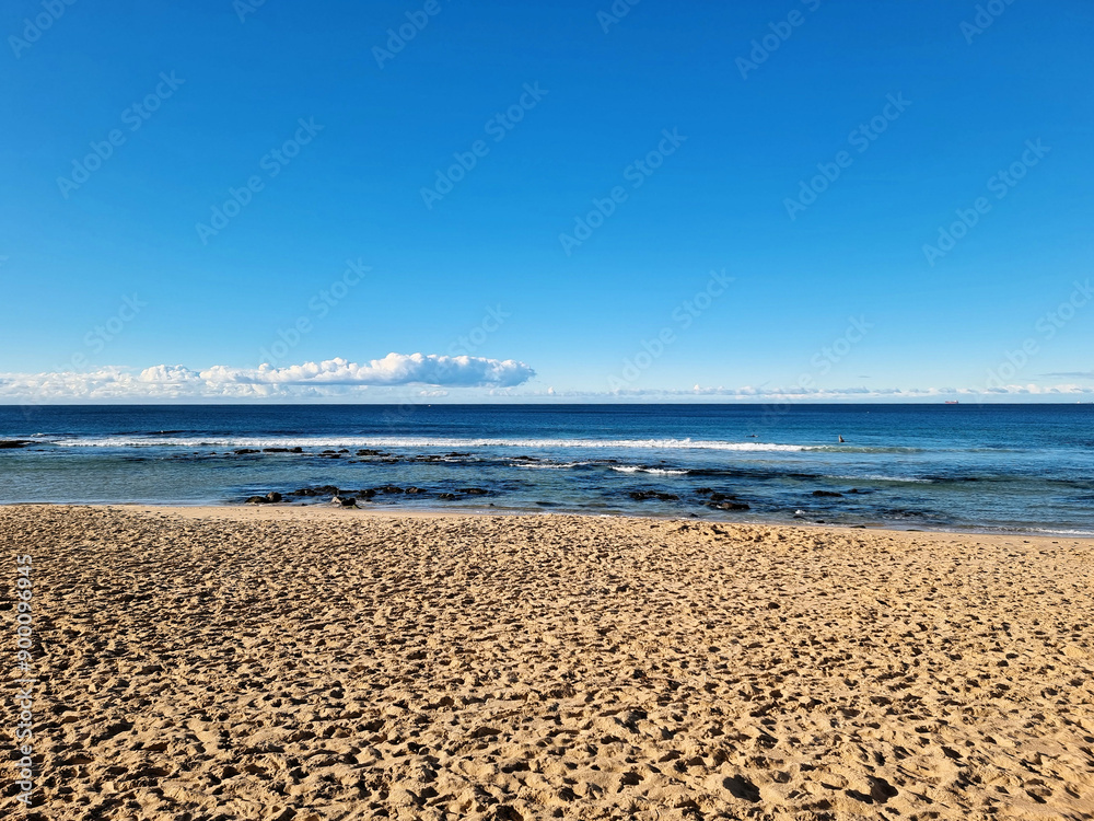 Bar Beach on a cold winter's morning. Clear blue sky with a few white clouds. Located near Newcastle New South Wales Australia Bar Beach on a cold winter's morning. Clear blue sky with a few white clouds. Located near Newcastle New South Wales Australia