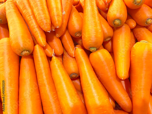Close up detail fresh and sweet bunch pile of carrot natural background